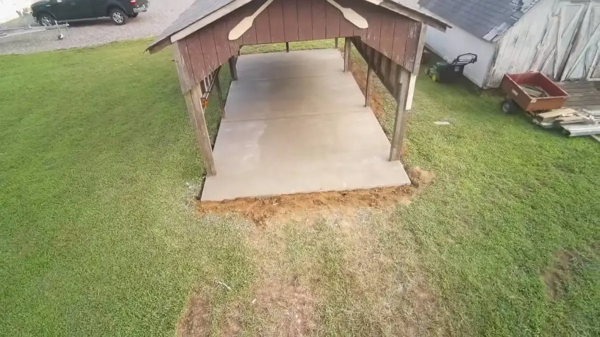 Completed concrete slab underneath a covered boat shelter